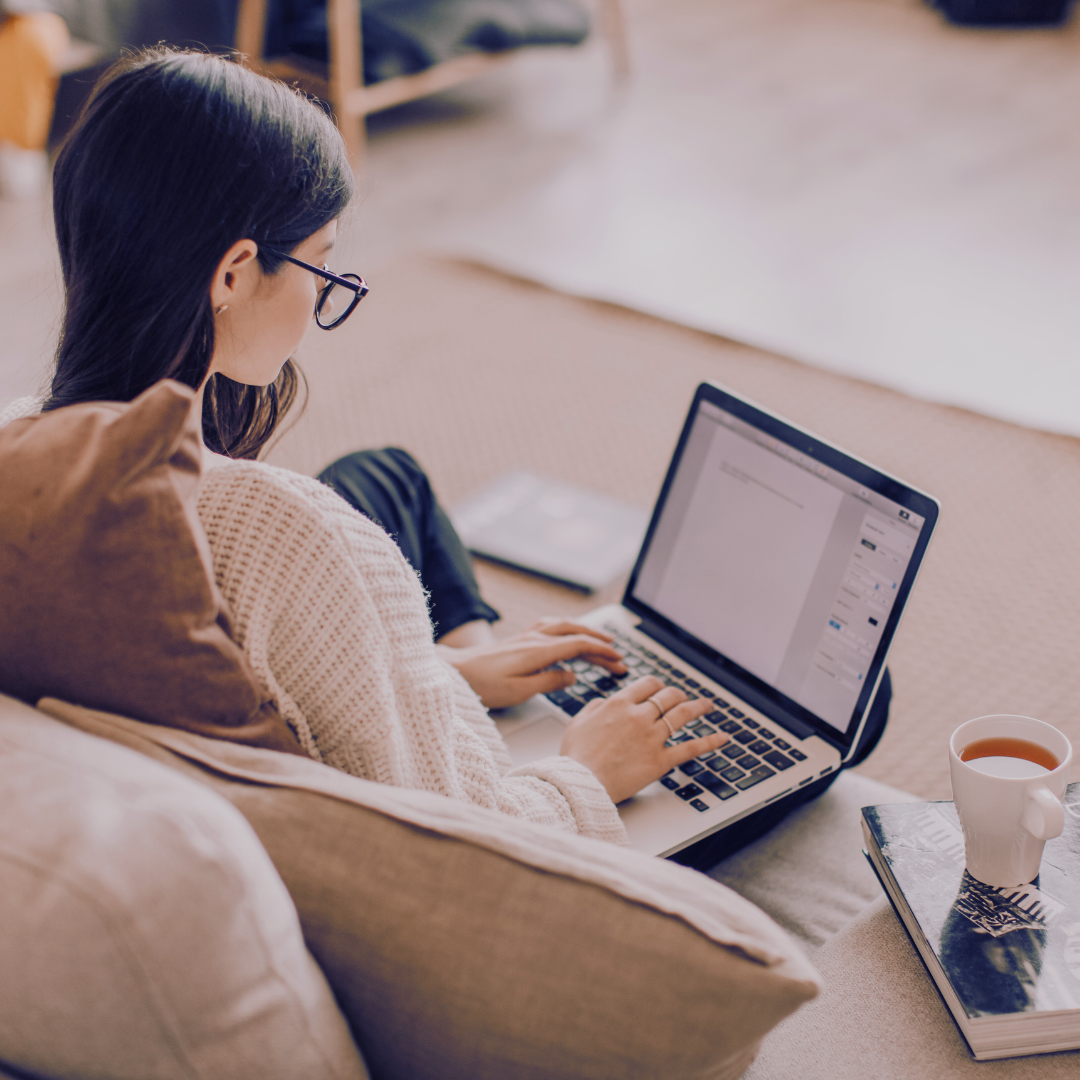 Interior designer working on SEO on laptop